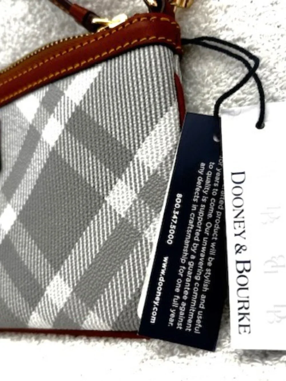 Dooney & Bourke large slim wristlet in Light Gray plaid NWT